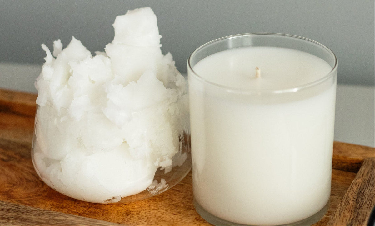 Raw soy wax beside a finished poured candle, the same material before and after it becomes a candle.